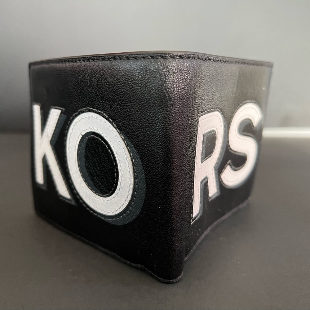 NWOT Micha l Kors single fold wallet.
